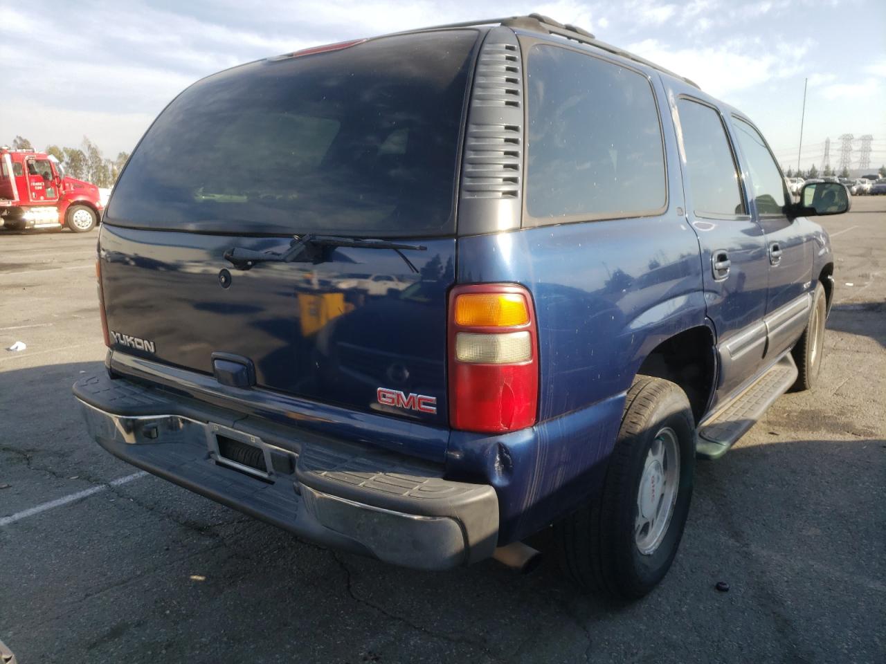 Photo 4 from auction – 2002 GMC YUKON with VIN 1GKEC13V62R308609