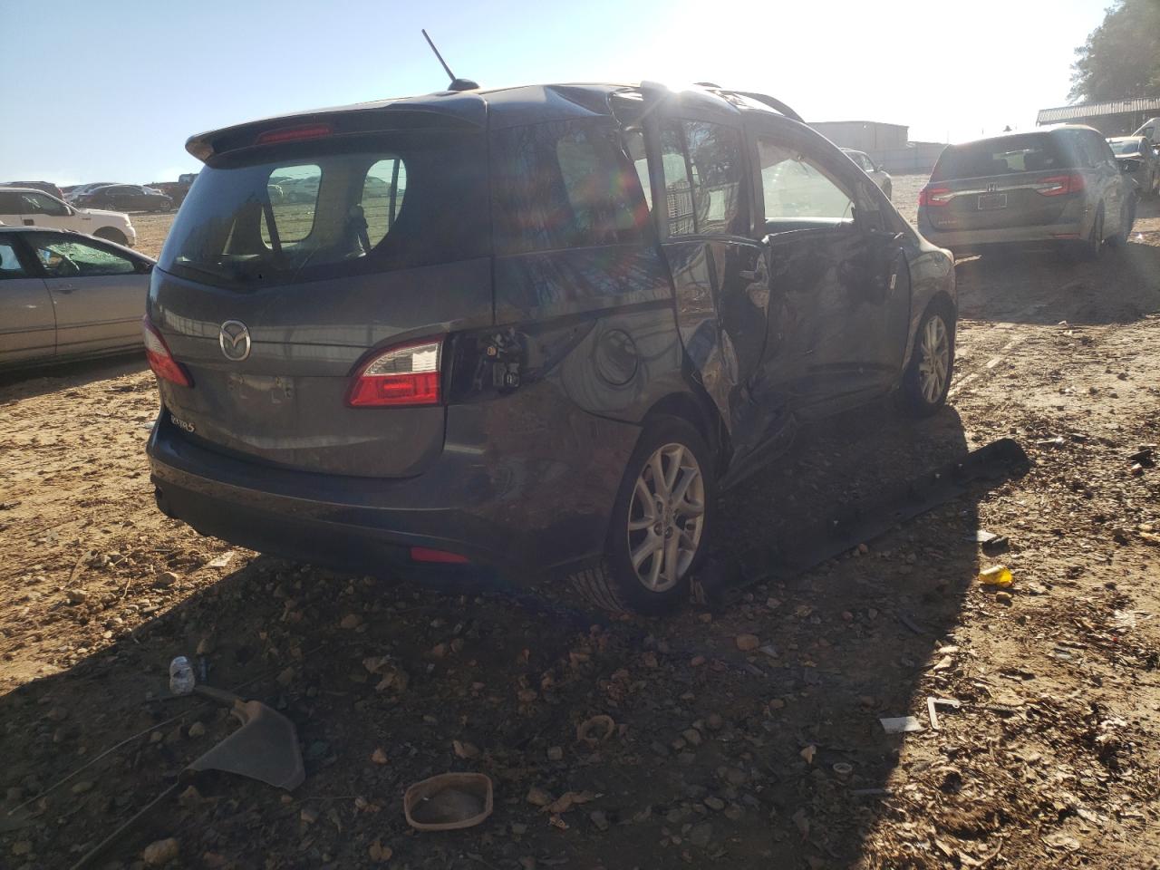 Photo 4 from auction – 2012 MAZDA 5 with VIN JM1CW2DLXC0132053
