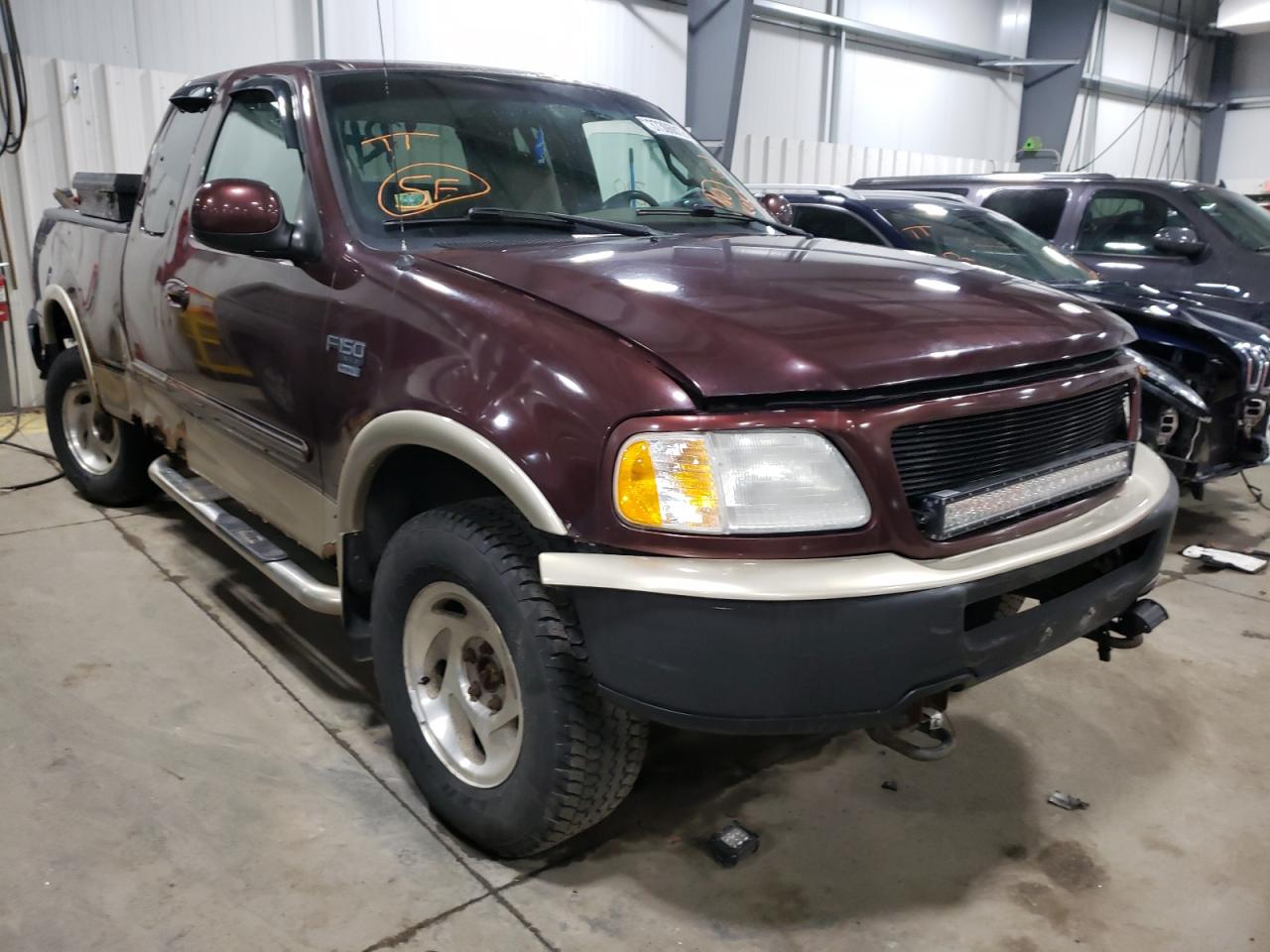 FORD F150 2000 with VIN 1FTRX18LXYNA81238 - Photo from auction