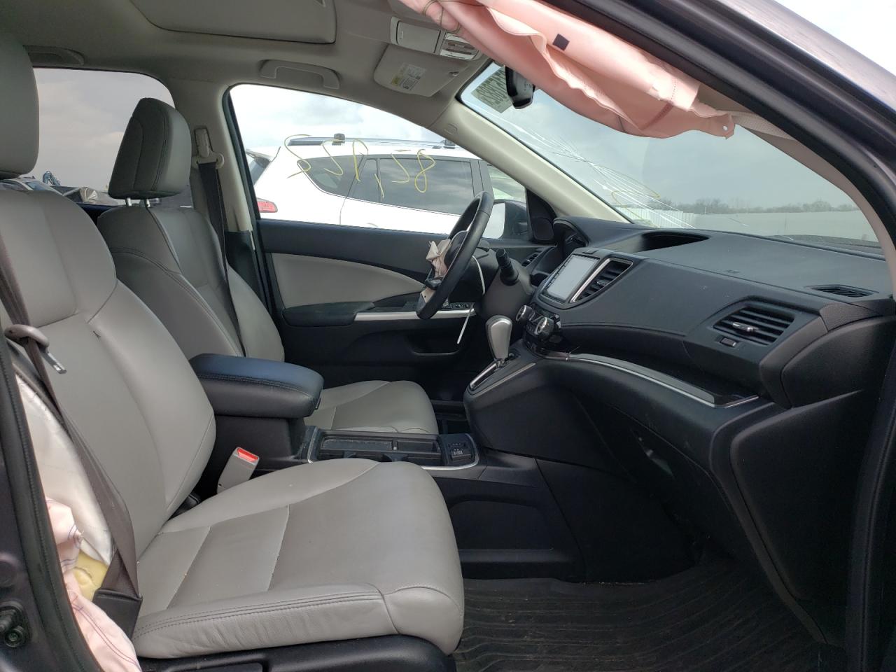 Photo 5 from auction – 2016 HONDA CR-V EXL with VIN 5J6RM4H75GL010191