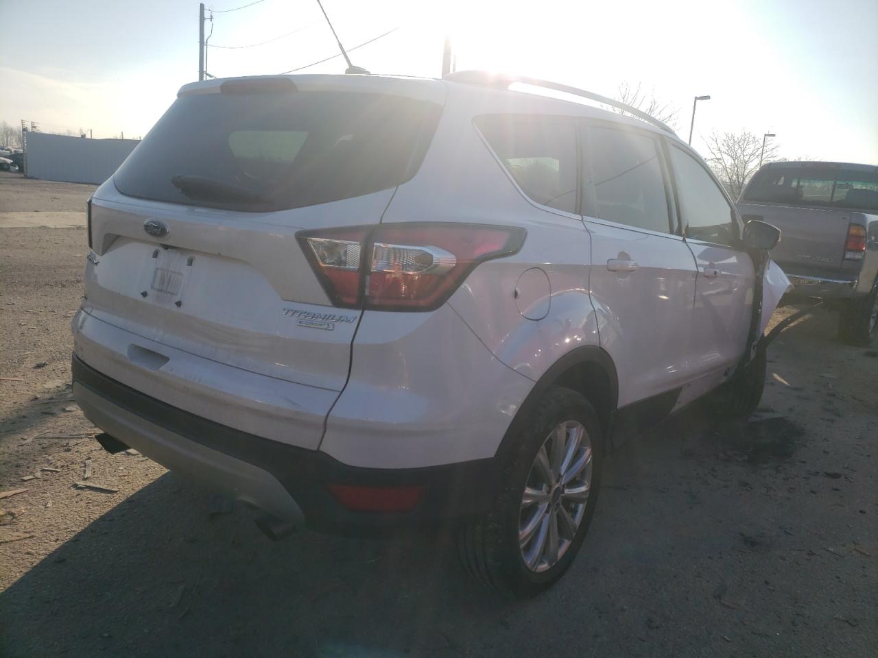 Photo 4 from auction – 2017 FORD ESCAPE TIT with VIN 1FMCU0JD8HUA11296