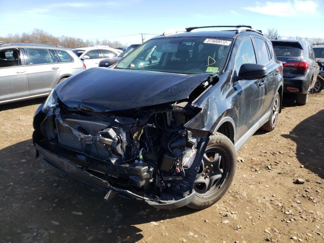 Photo 2 from auction – 2016 TOYOTA RAV4 LE with VIN 2T3BFREV8GW424032