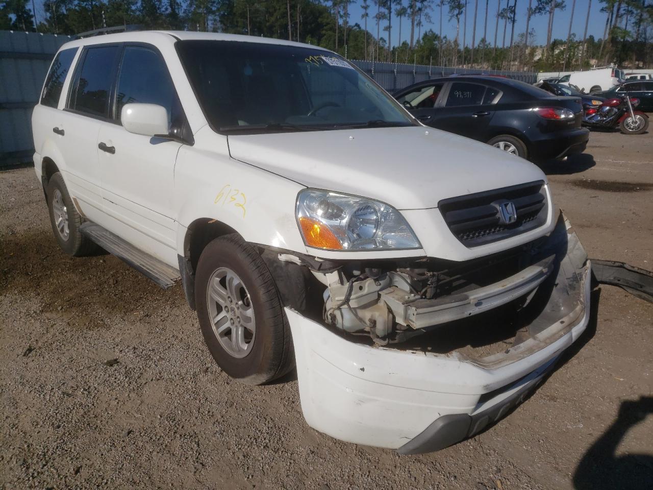 HONDA PILOT 2003 with VIN 2HKYF18473H530990 - Photo from auction