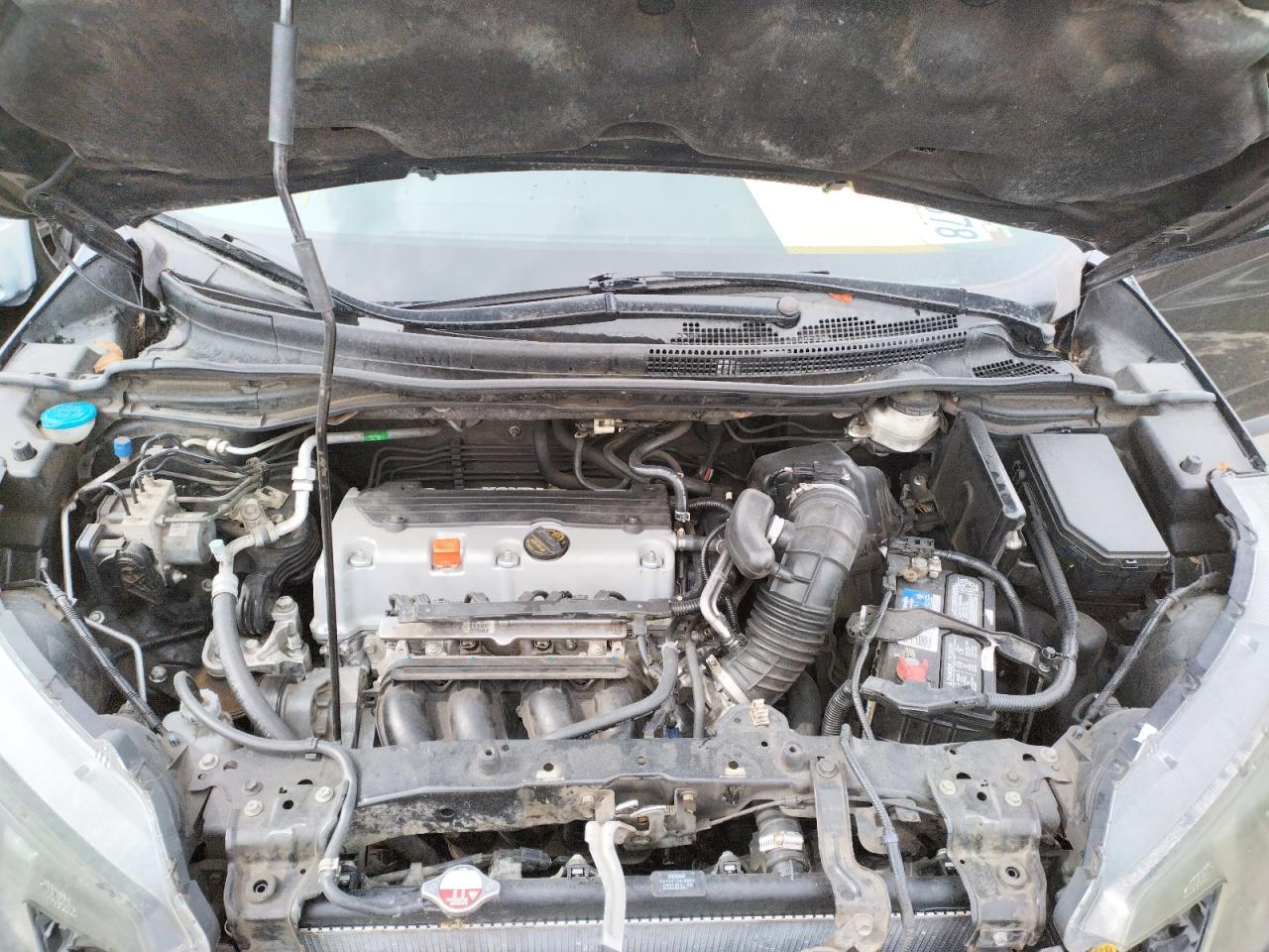 Photo 7 from auction – 2012 HONDA CR-V LX with VIN 2HKRM3H31CH510599
