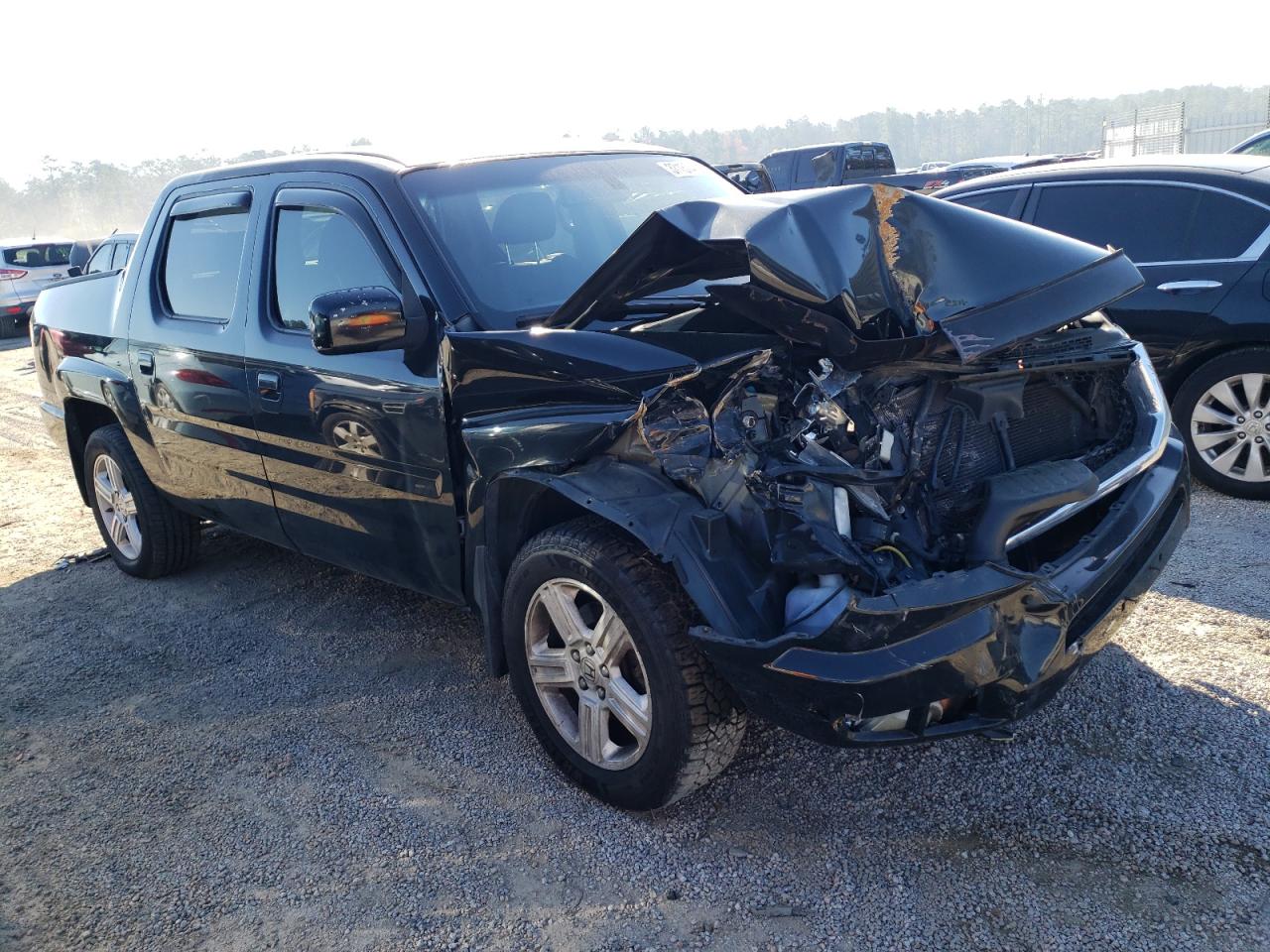 HONDA RIDGELINE 2009 with VIN 5FPYK16509B106752 - Photo from auction