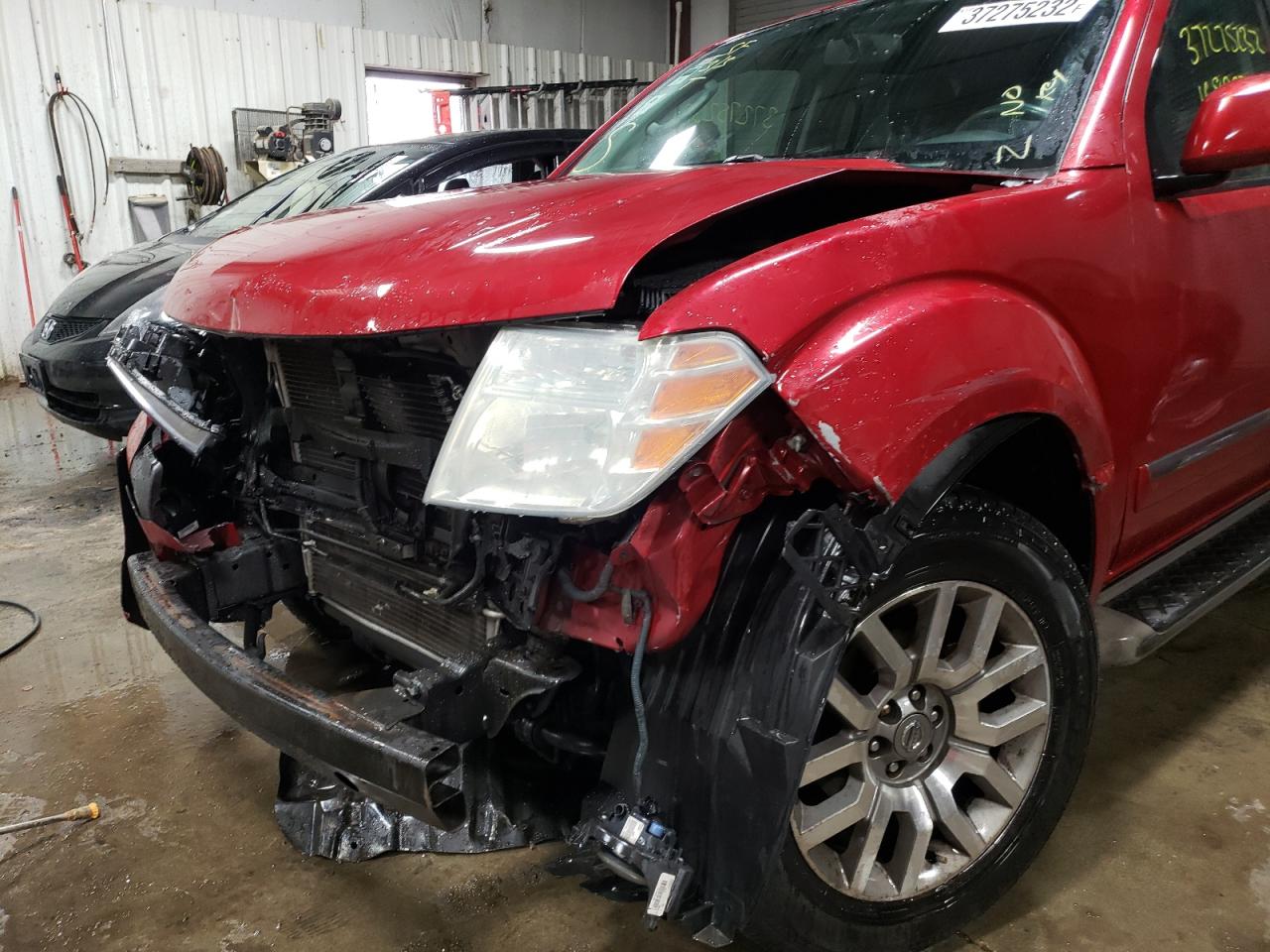 Photo 9 from auction – 2010 NISSAN PATHFINDER with VIN 5N1AR1NBXAC615242