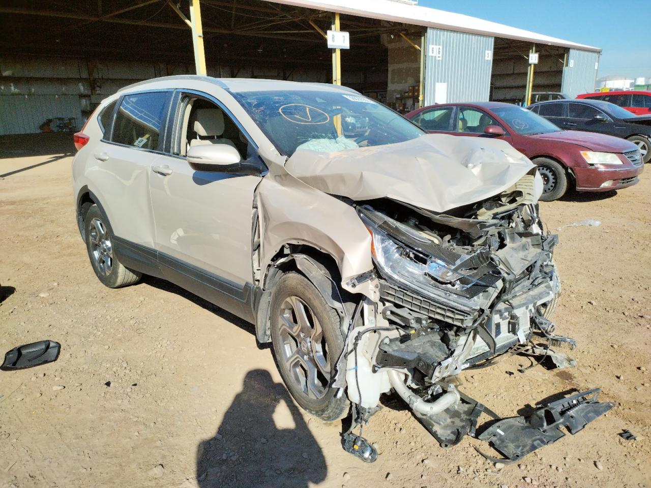 HONDA CR-V EX 2018 with VIN 5J6RW2H54JL025852 - Photo from auction