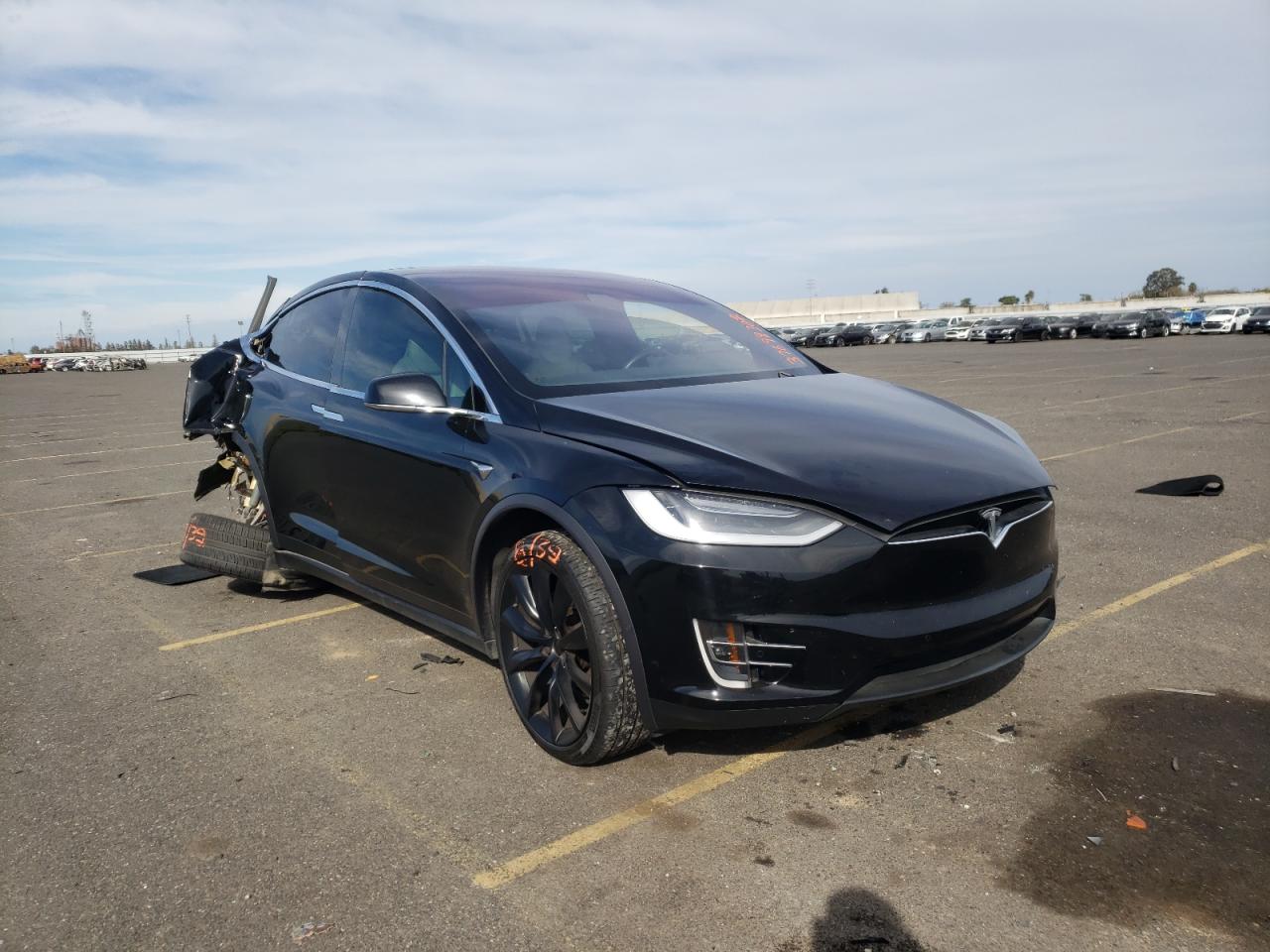 TESLA MODEL X 2019 with VIN 5YJXCBE22KF210390 - Photo from auction