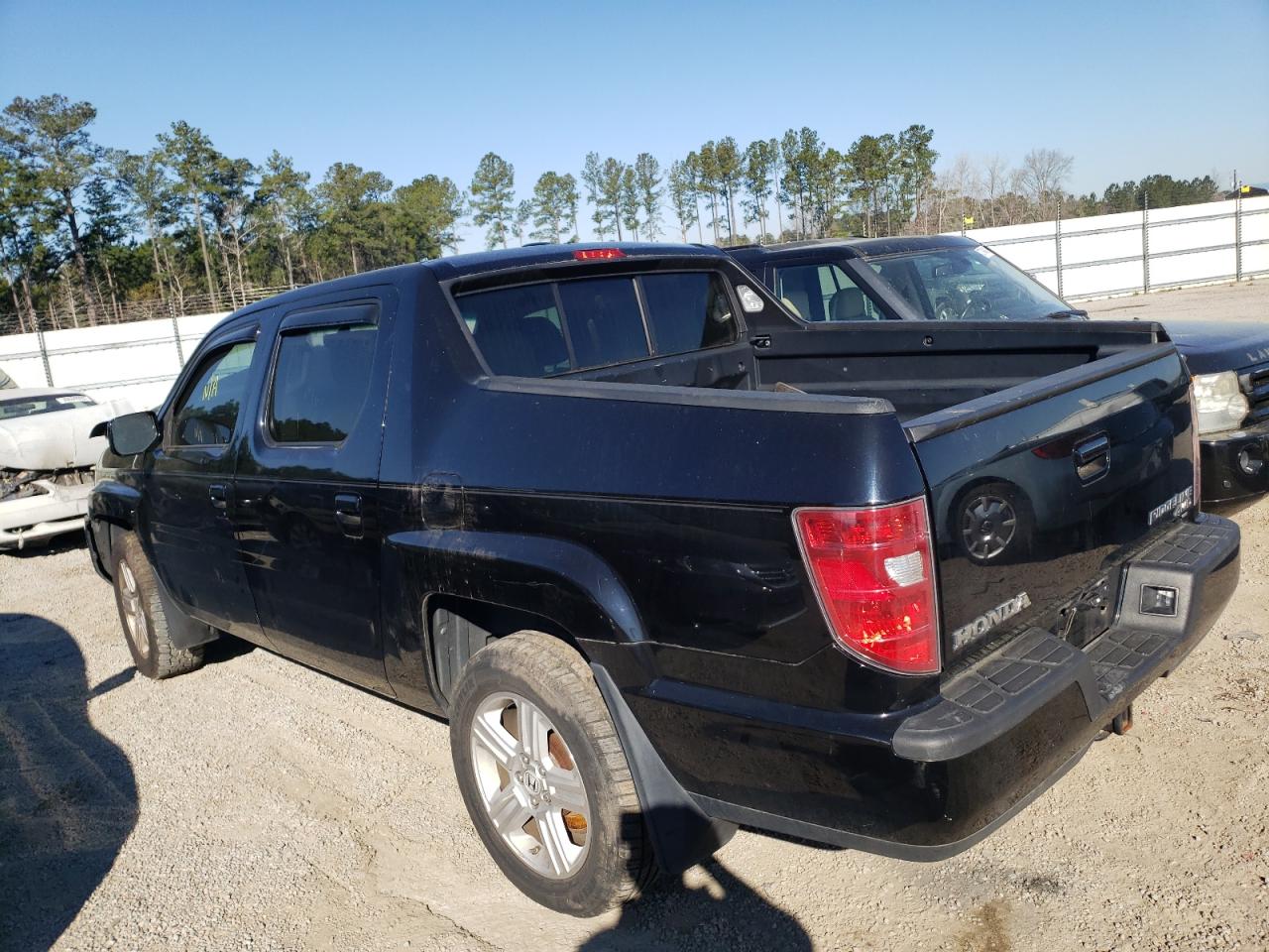 Photo 3 from auction – 2009 HONDA RIDGELINE with VIN 5FPYK16509B106752