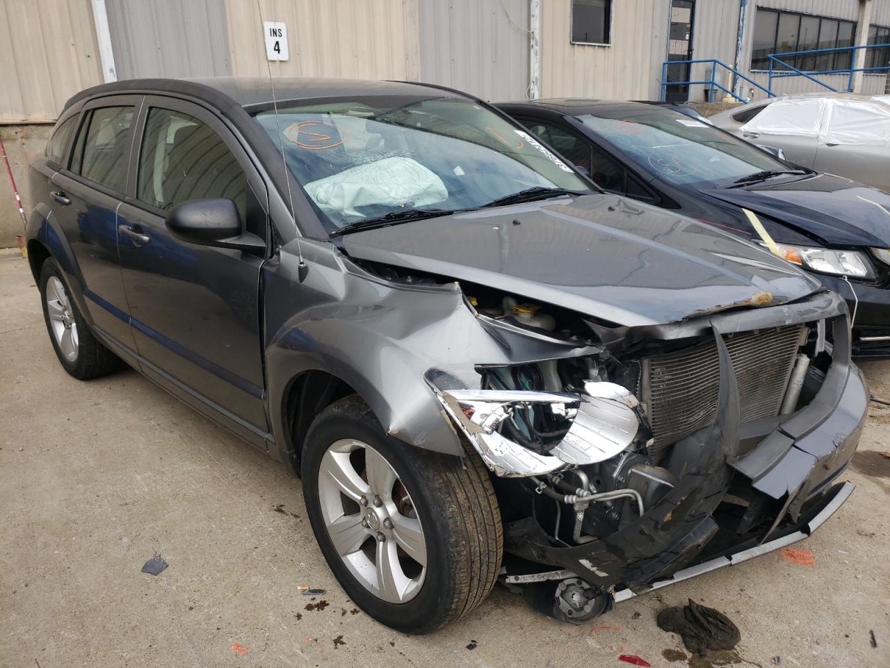 DODGE CALIBER MA 2011 with VIN 1B3CB3HAXBD237601 - Photo from auction