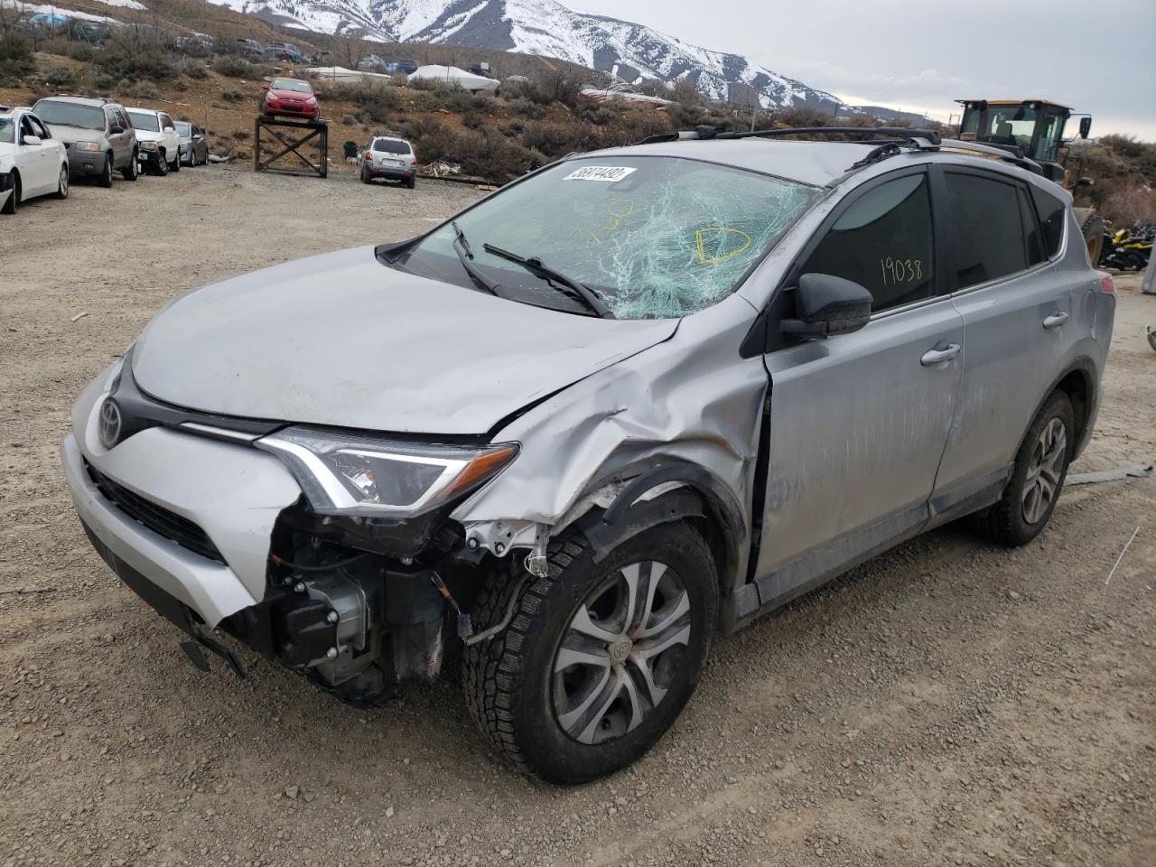 Photo 2 from auction – 2018 TOYOTA RAV4 LE with VIN 2T3BFREV7JW720473