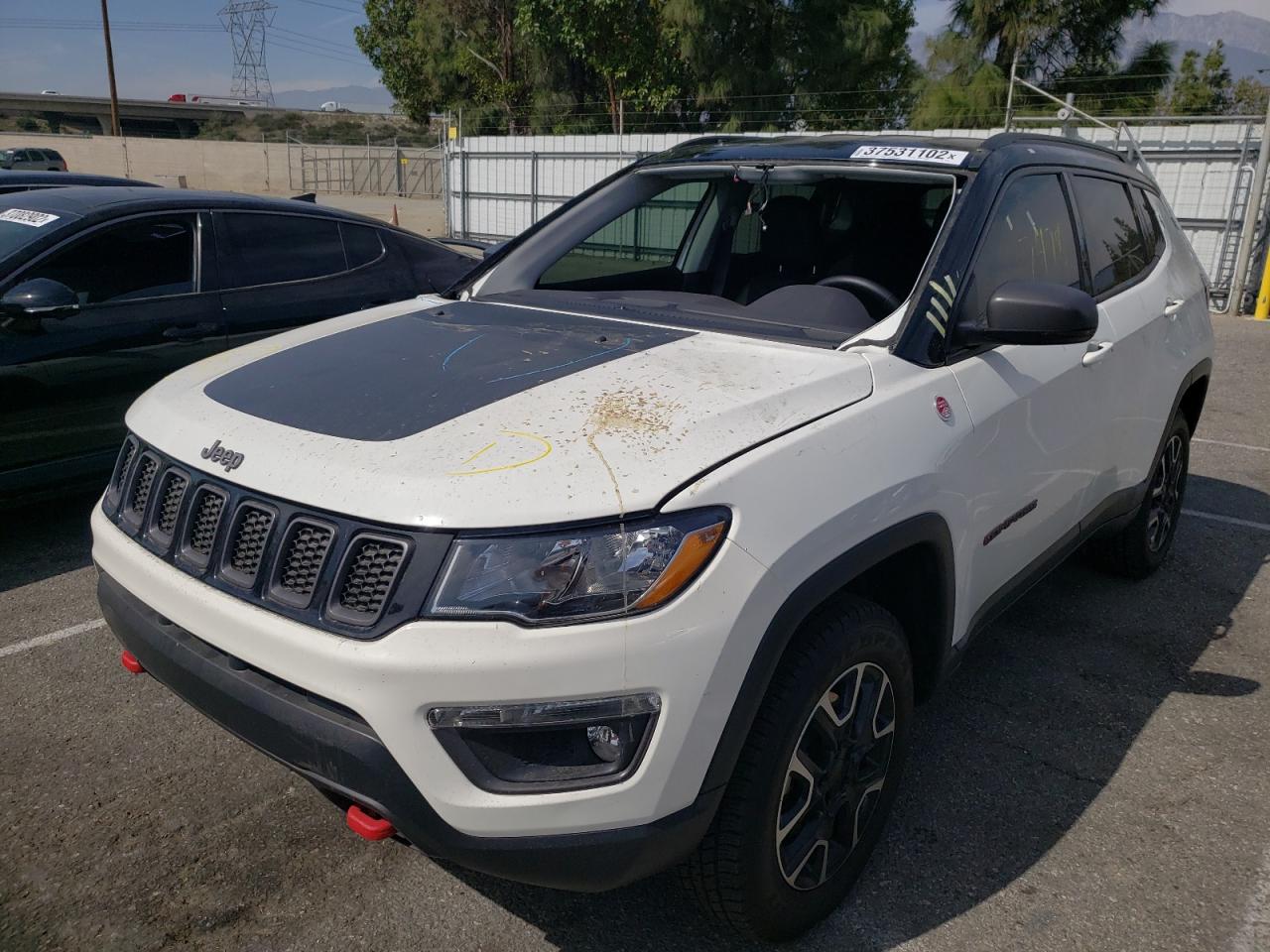 Photo 2 from auction – 2021 JEEP COMPASS TR with VIN 3C4NJDDB6MT543125