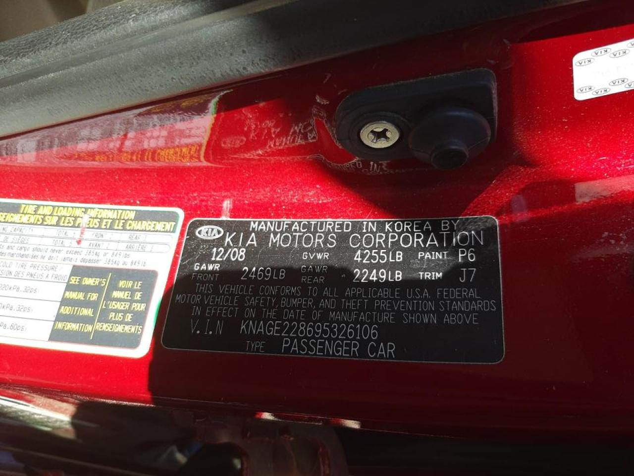 Photo 10 from auction – 2009 KIA OPTIMA LX with VIN KNAGE228695326106