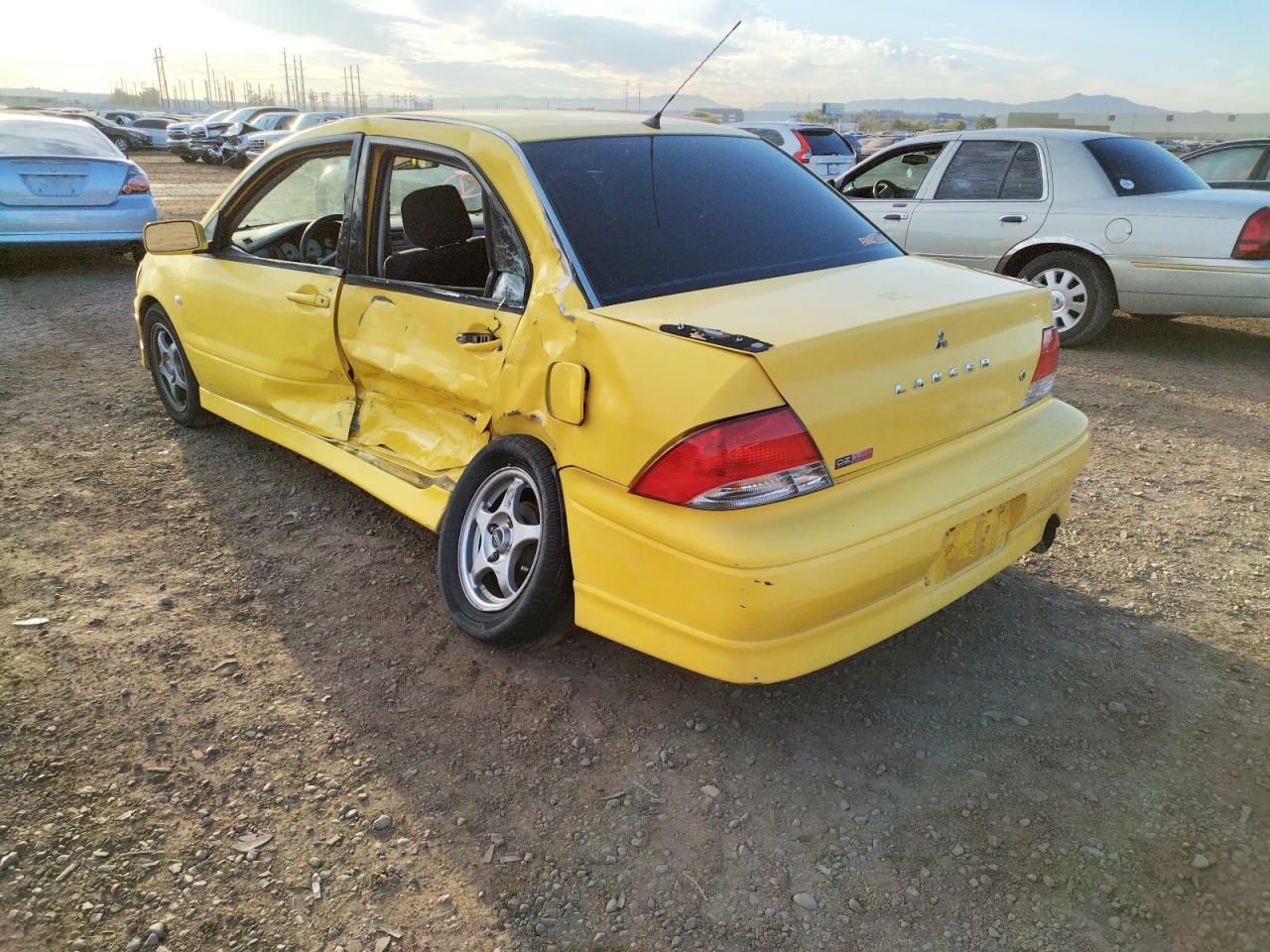 Photo 3 from auction – 2002 MITSUBISHI LANCER OZ with VIN JA3AJ86E32U080505