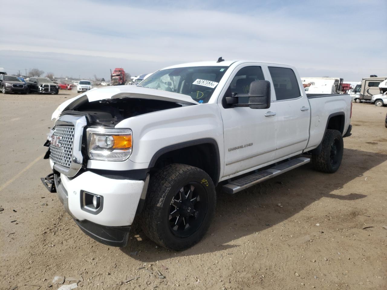 Photo 2 from auction – 2015 GMC SIERRA K25 with VIN 1GT120E87FF184419