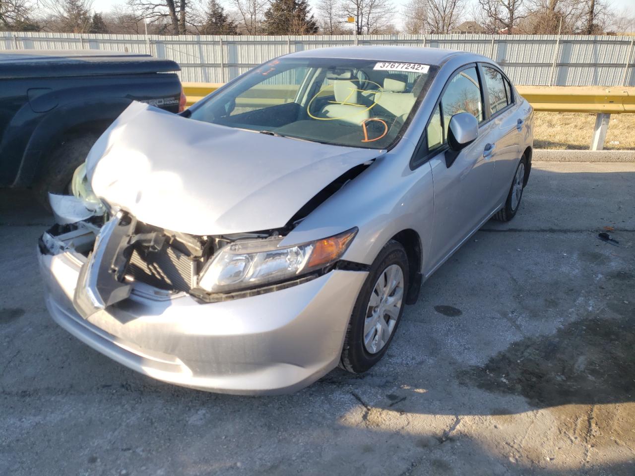 Photo 2 from auction – 2012 HONDA CIVIC LX with VIN 19XFB2F57CE061201
