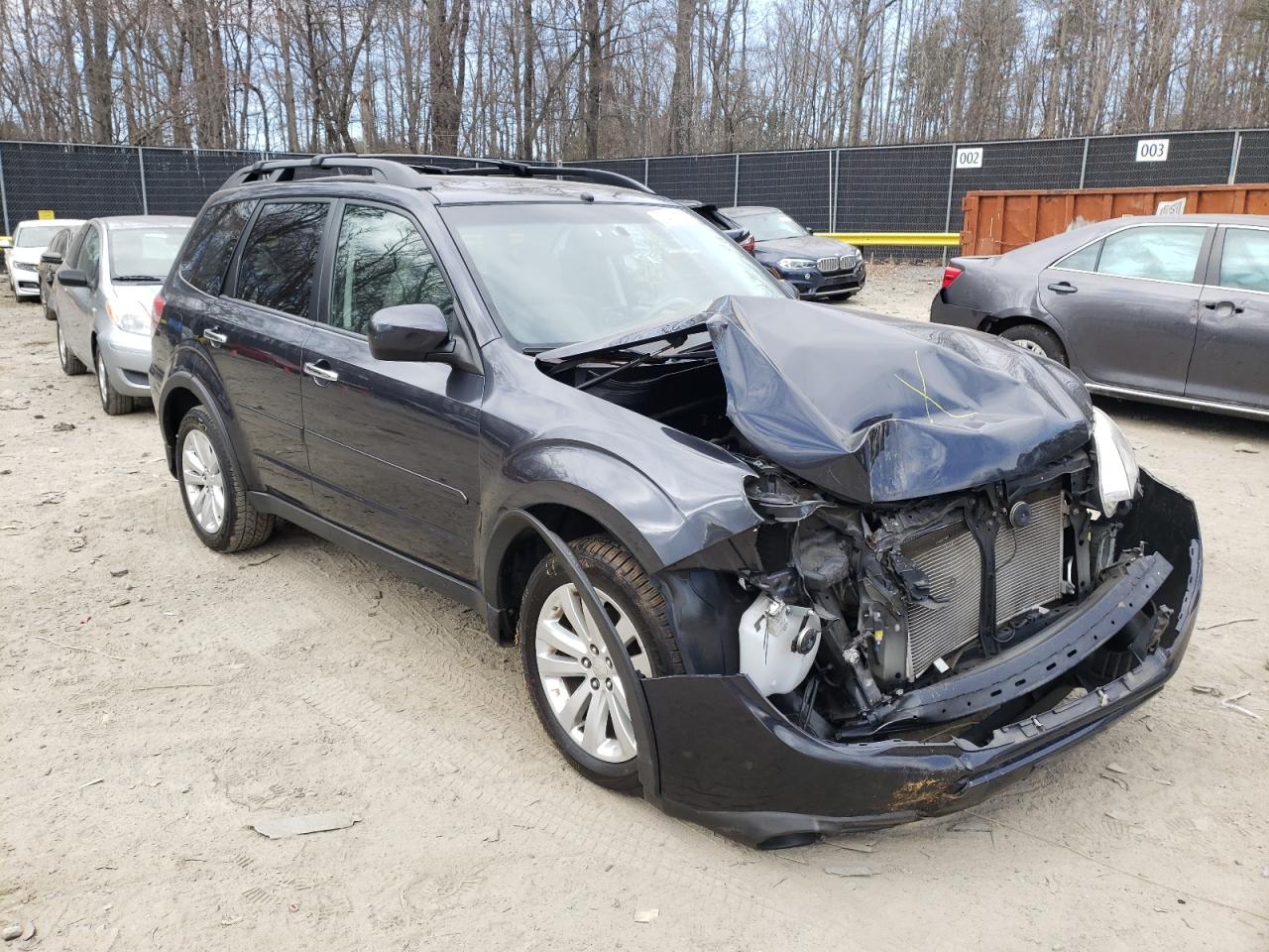 SUBARU FORESTER L 2011 with VIN JF2SHAEC4BH750212 - Photo from auction