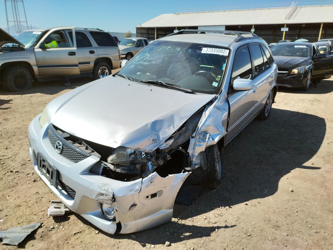 Photo 9 from auction – 2003 MAZDA PROTEGE PR with VIN JM1BJ245131111159
