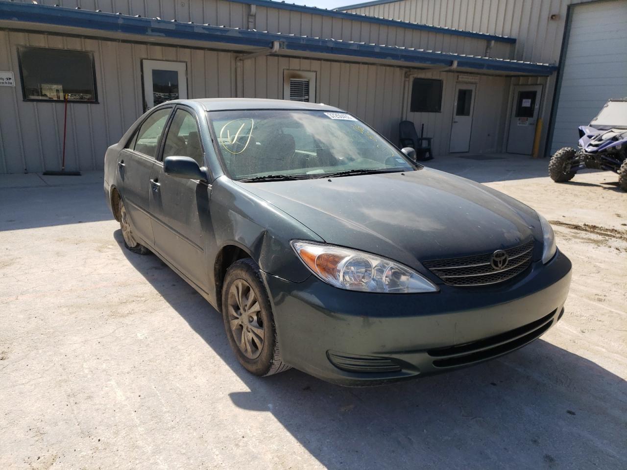 TOYOTA CAMRY LE 2004 with VIN 4T1BF32K14U068812 - Photo from auction