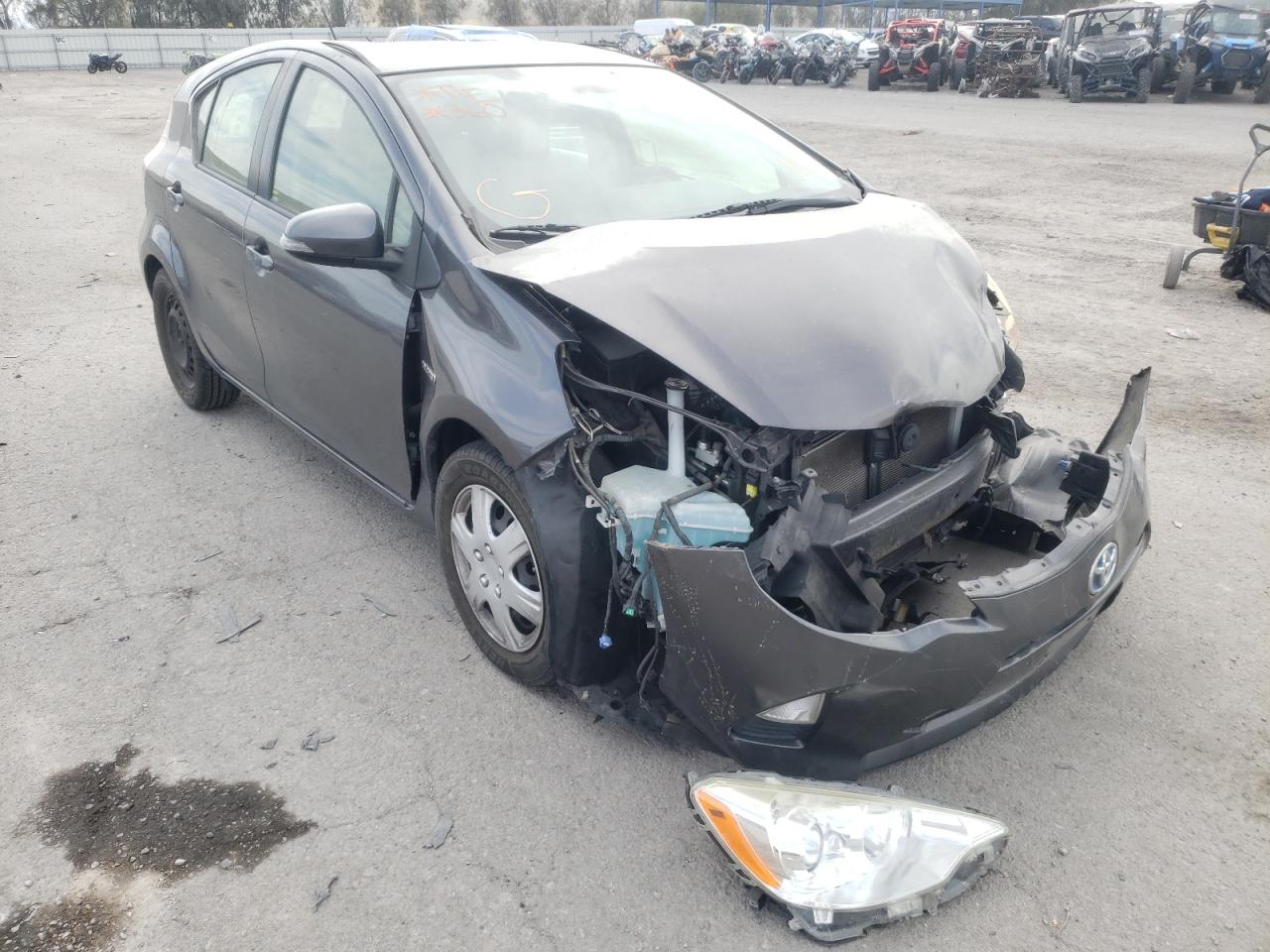 TOYOTA PRIUS C 2014 with VIN JTDKDTB38E1070532 - Photo from auction