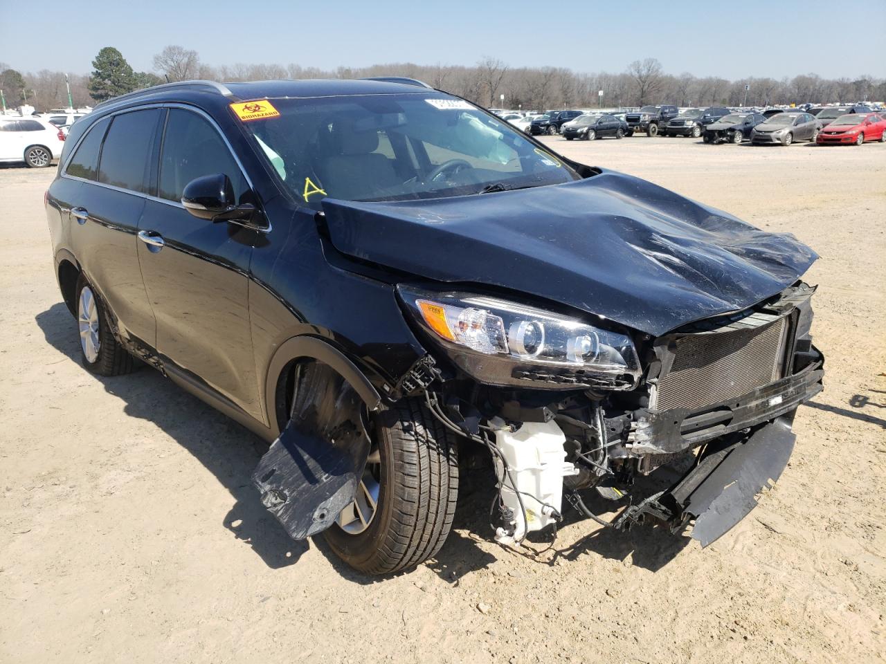 KIA SORENTO LX 2016 with VIN 5XYPG4A55GG079312 - Photo from auction