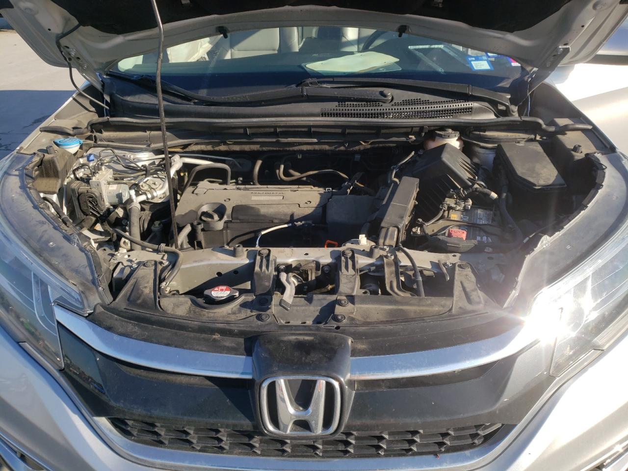 Photo 7 from auction – 2016 HONDA CR-V EXL with VIN 5J6RM4H7XGL074078