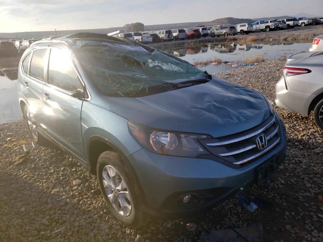 Photo 1 from auction – 2014 HONDA CR-V EXL with VIN 2HKRM4H74EH670908