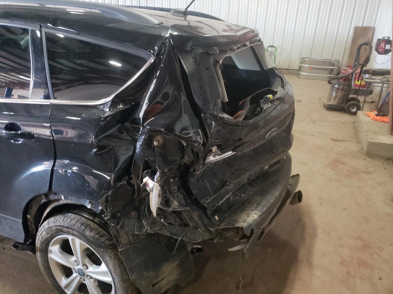 Photo 9 from auction – 2014 FORD ESCAPE SE with VIN 1FMCU0GX1EUC44238