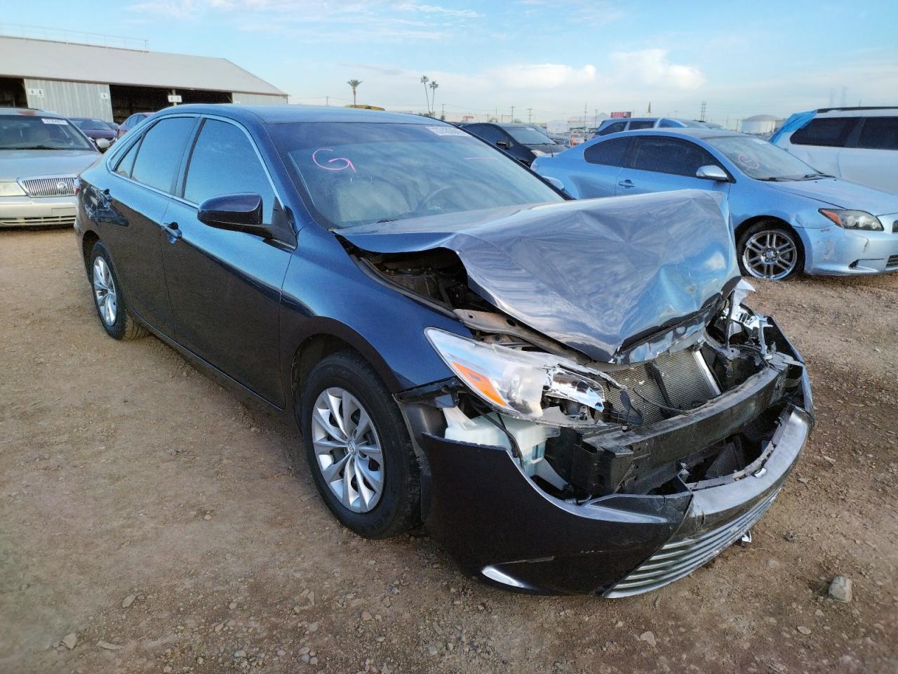 TOYOTA CAMRY LE 2017 with VIN 4T1BF1FK4HU765802 - Photo from auction
