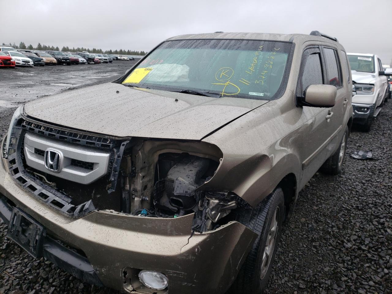 Photo 2 from auction – 2011 HONDA PILOT EX with VIN 5FNYF4H41BB094572