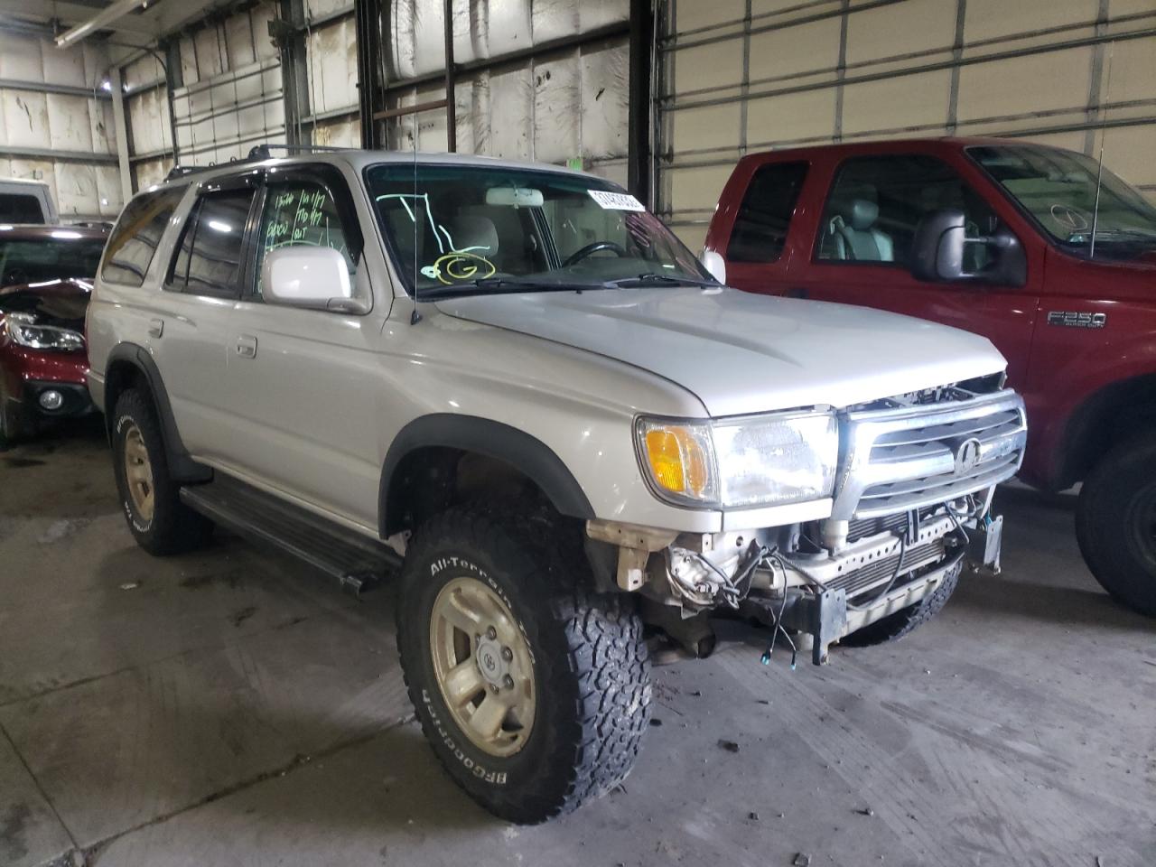 TOYOTA 4RUNNER SR 1999 with VIN JT3HN86R5X0248767 - Photo from auction