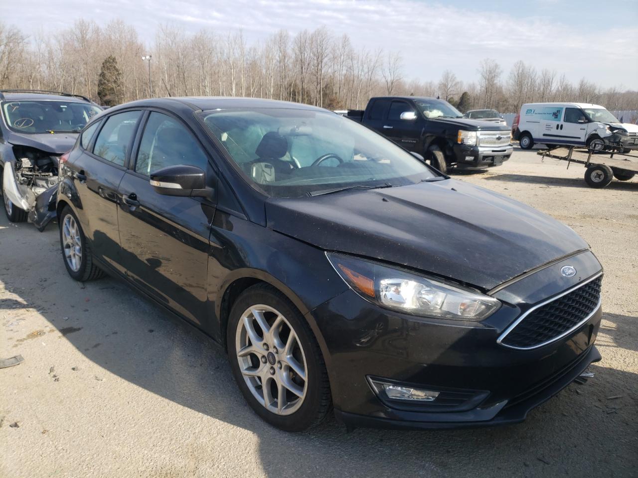 FORD FOCUS SE 2015 with VIN 1FADP3K21FL227563 - Photo from auction