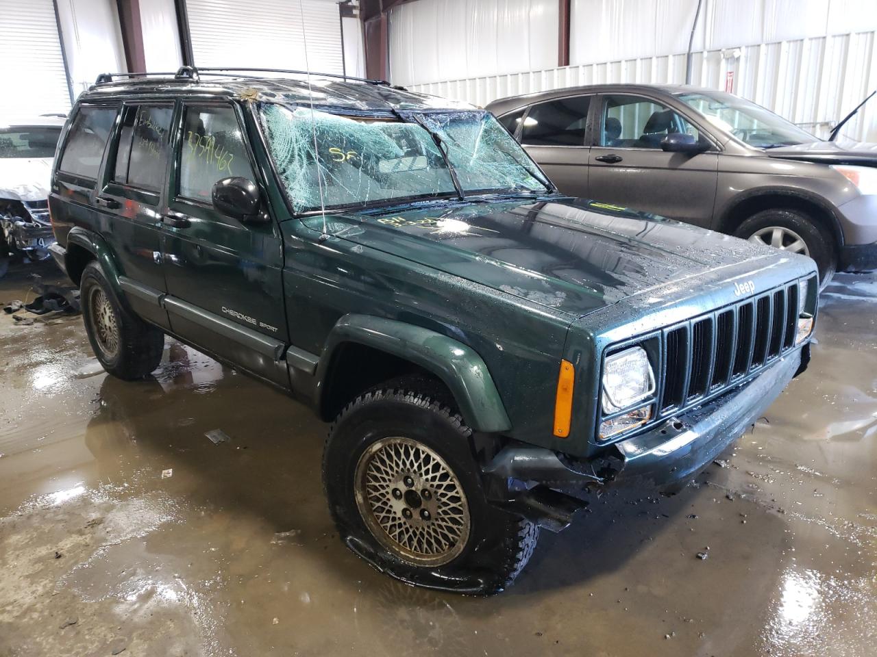 JEEP CHEROKEE S 2000 with VIN 1J4FF48SXYL255801 - Photo from auction