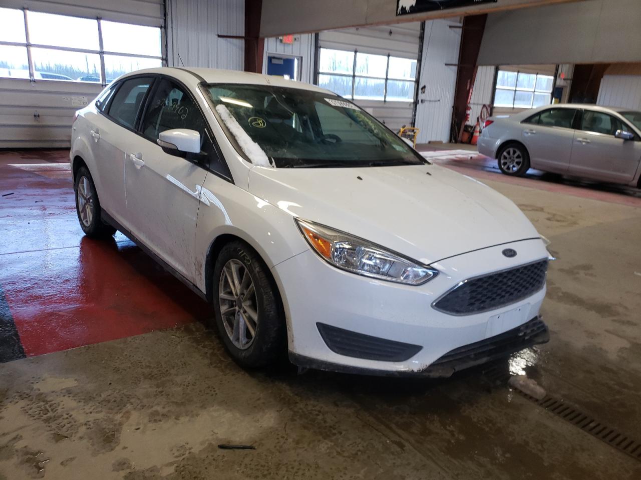 Photo 9 from auction – 2016 FORD FOCUS SE with VIN 1FADP3F20GL243636