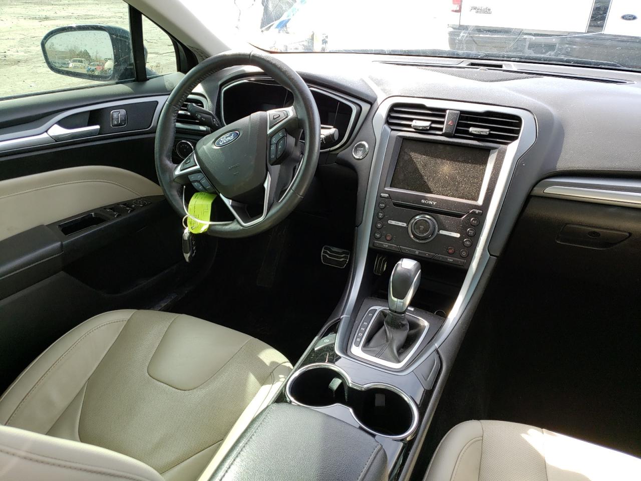 Photo 9 from auction – 2016 FORD FUSION TIT with VIN 3FA6P0D96GR252835