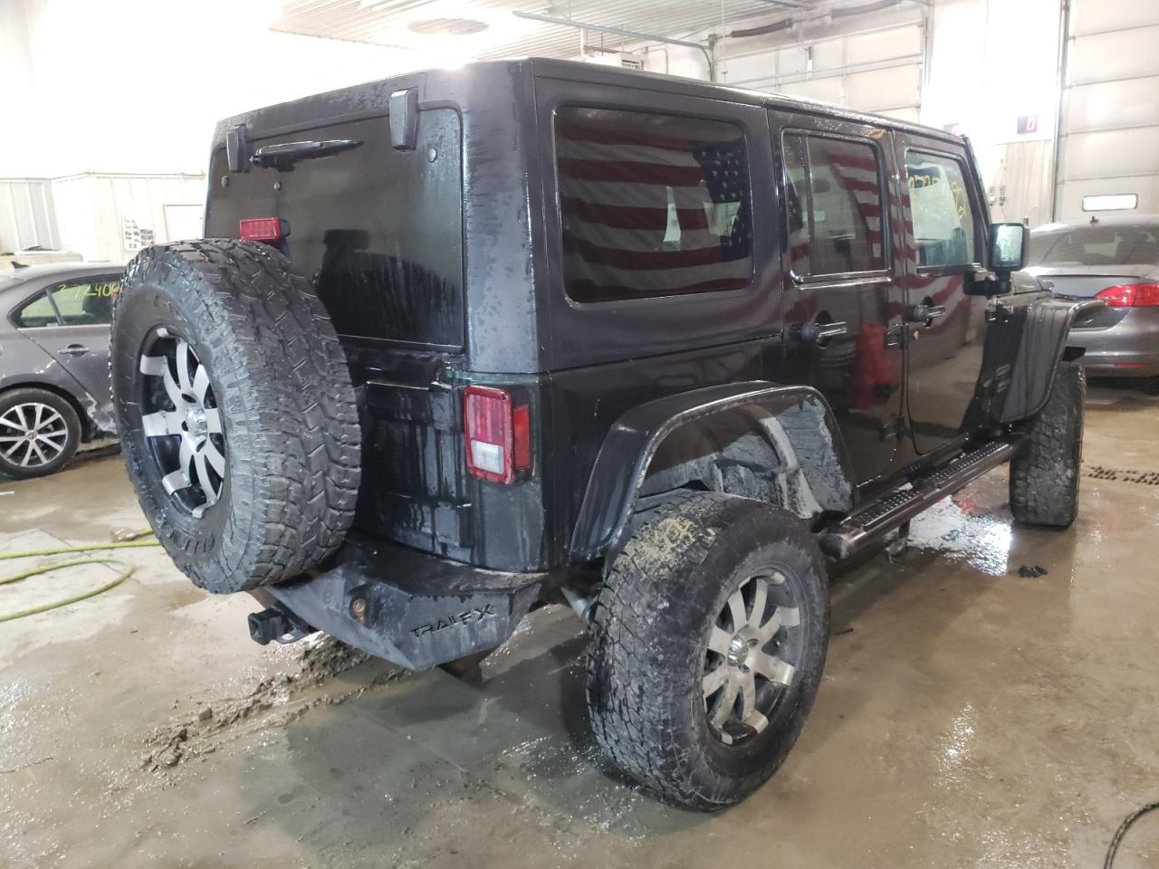 Photo 4 from auction – 2011 JEEP WRANGLER U with VIN 1J4BA3H14BL523537