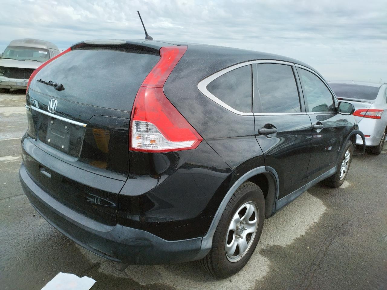 Photo 4 from auction – 2012 HONDA CR-V LX with VIN 2HKRM3H31CH510599