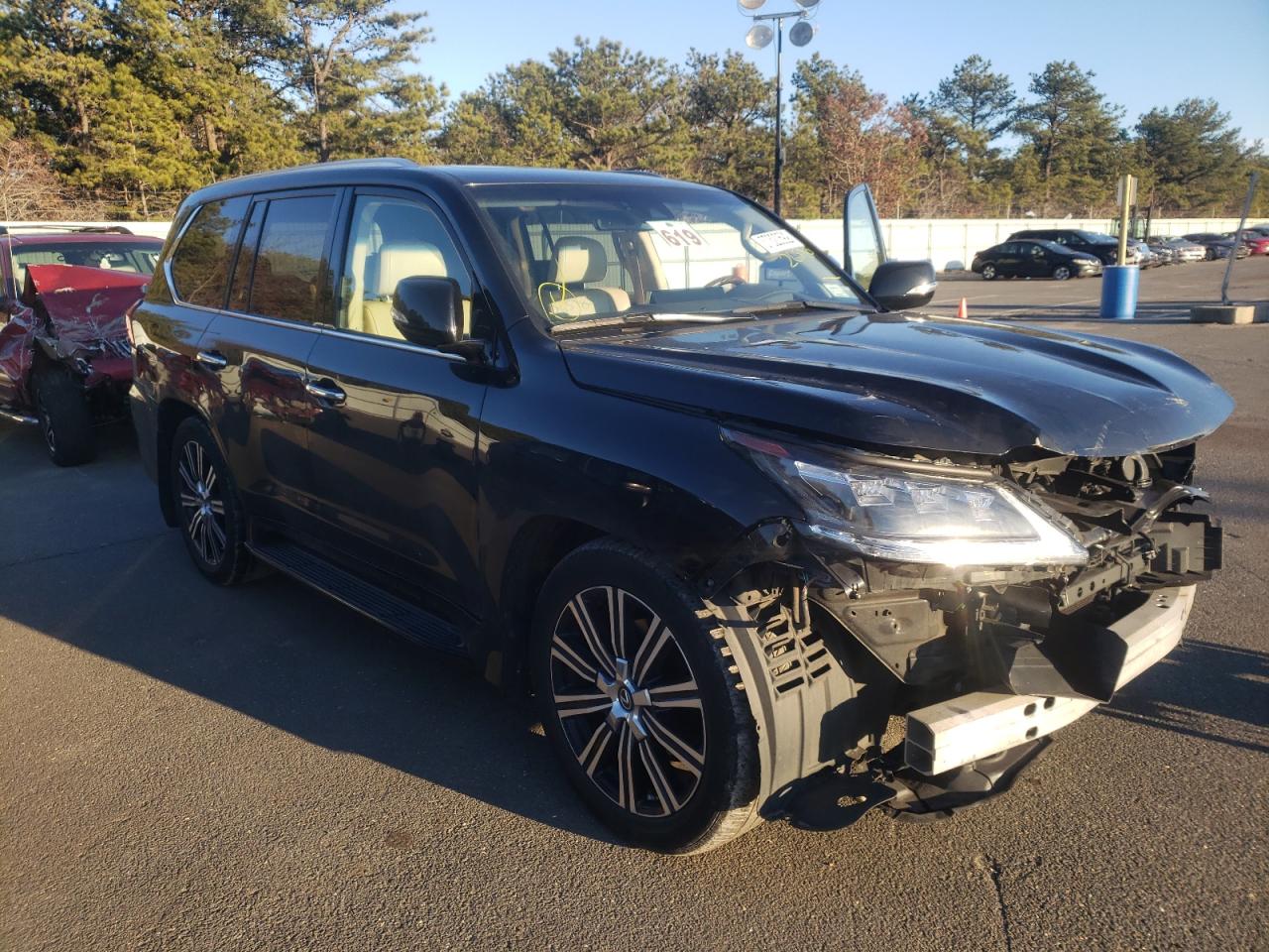 LEXUS LX 570 2018 with VIN JTJHY7AX1J4265985 - Photo from auction