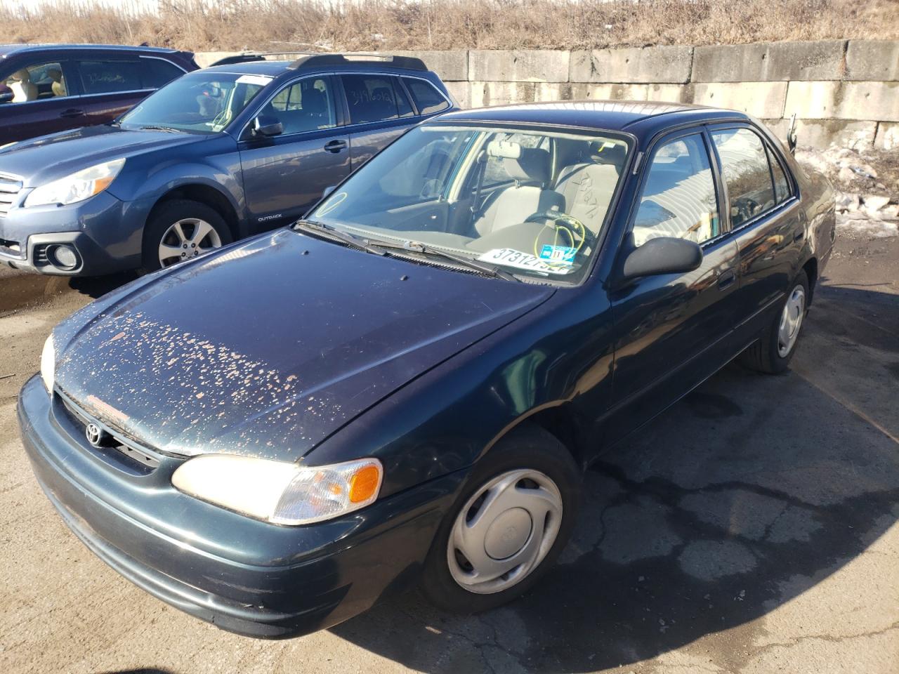 Photo 2 from auction – 1999 TOYOTA COROLLA with VIN 2T1BR12E7XC130659