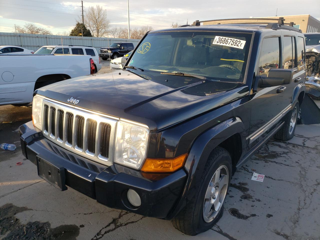 Photo 2 from auction – 2010 JEEP COMMANDER with VIN 1J4RG4GK8AC106854