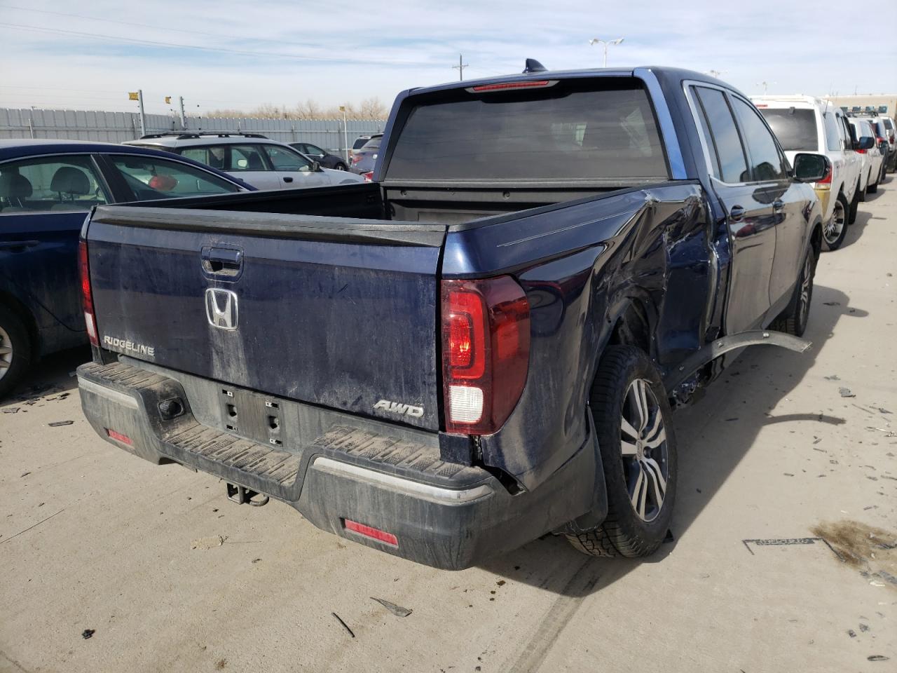 Photo 4 from auction – 2017 HONDA RIDGELINE with VIN 5FPYK3F49HB022978