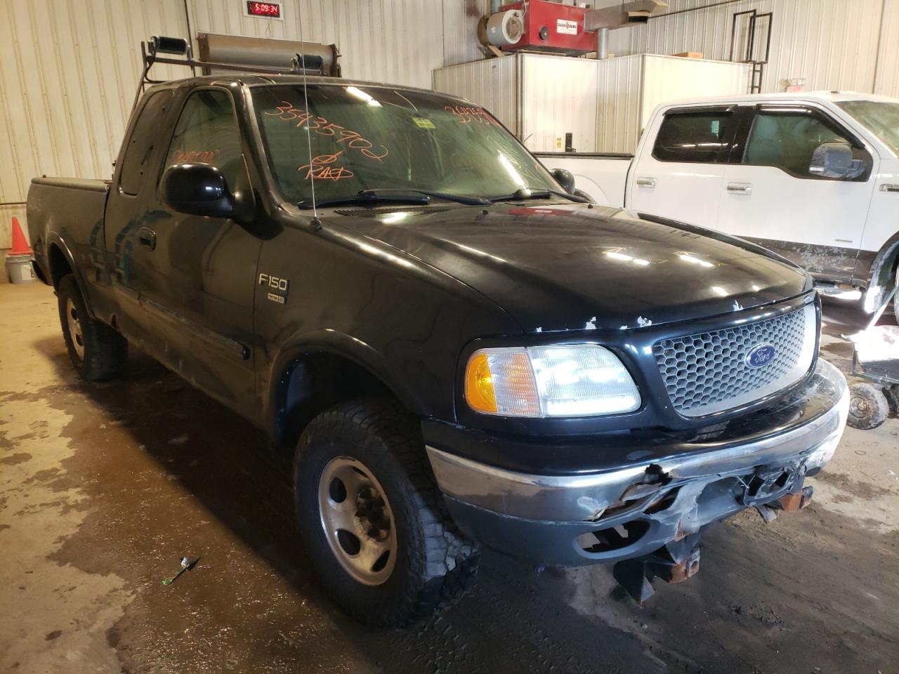 FORD F150 2003 with VIN 1FTRX18WX3NA20393 - Photo from auction