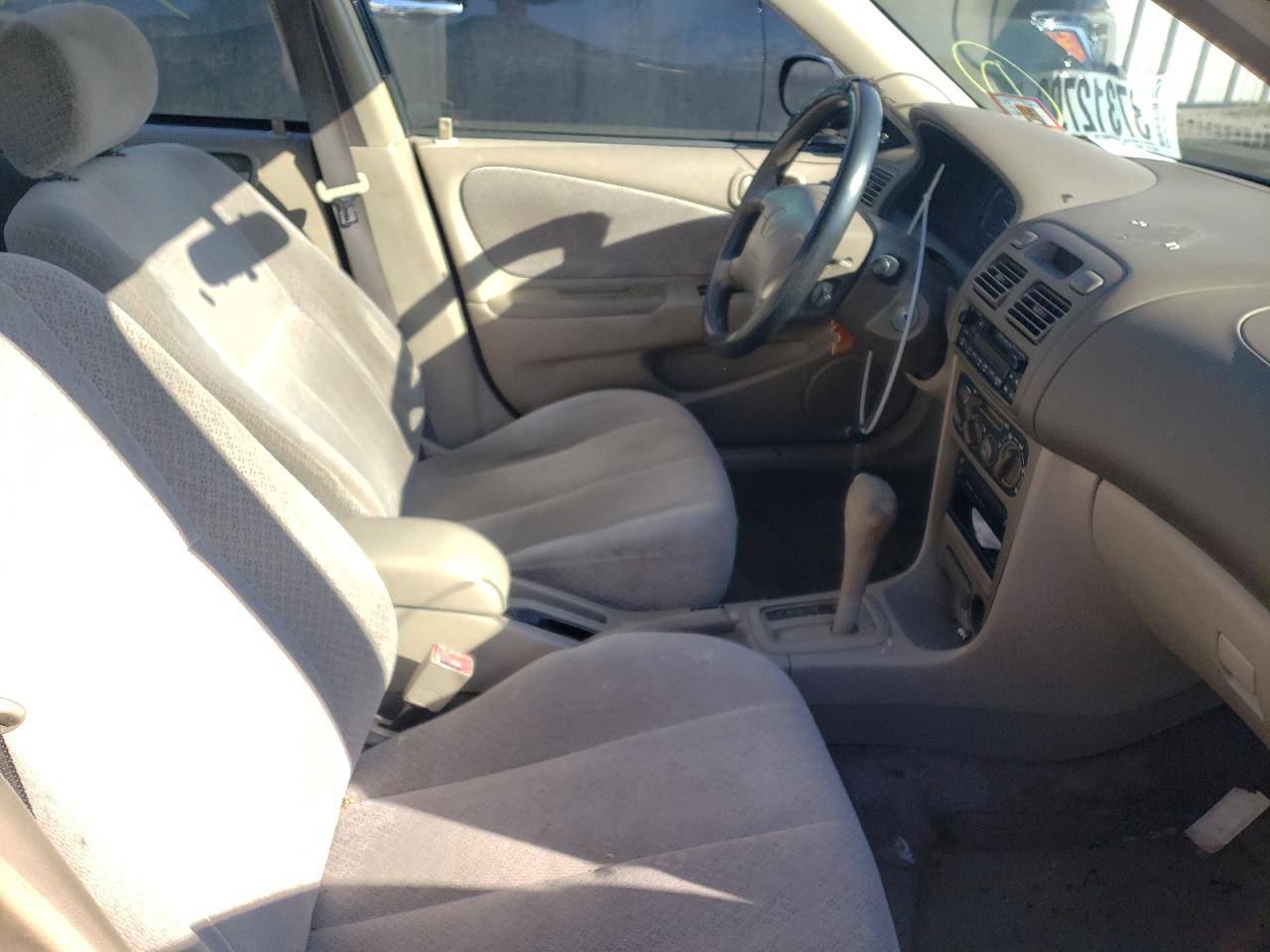 Photo 5 from auction – 1999 TOYOTA COROLLA with VIN 2T1BR12E7XC130659