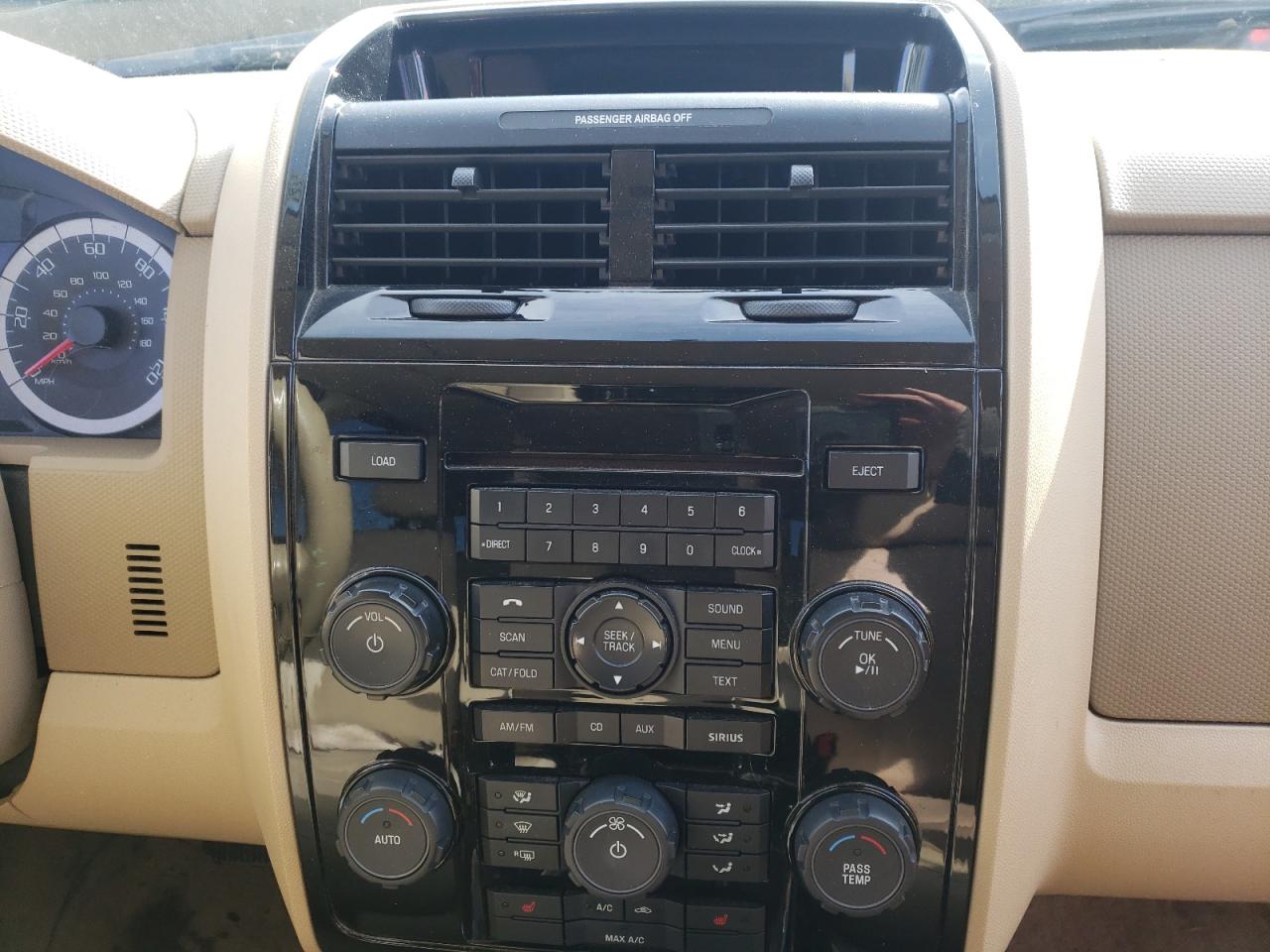 Photo 9 from auction – 2010 FORD ESCAPE LIM with VIN 1FMCU9E76AKC52736