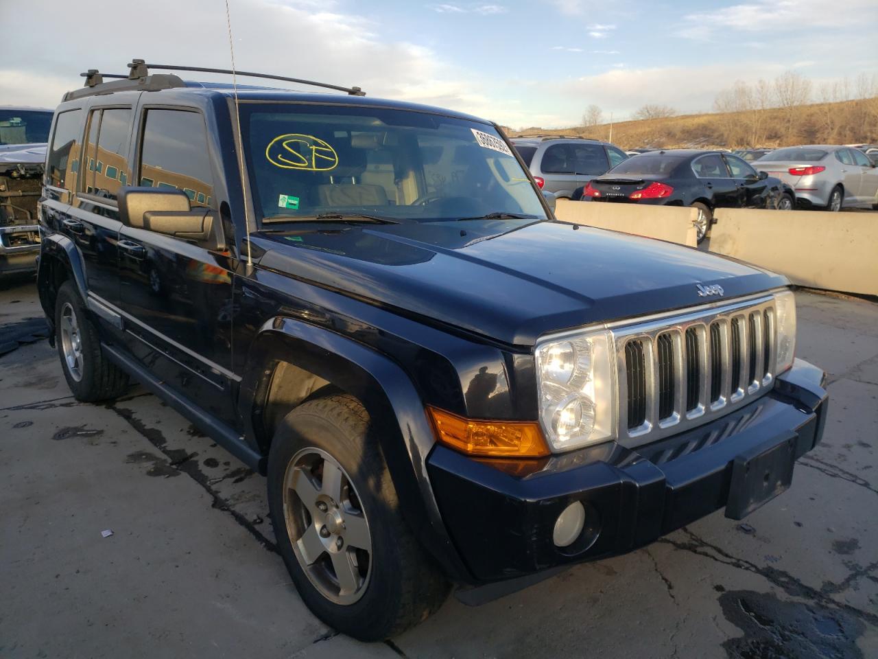 JEEP COMMANDER 2010 with VIN 1J4RG4GK8AC106854 - Photo from auction