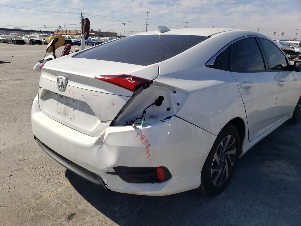 Photo 9 from auction – 2017 HONDA CIVIC EX with VIN 2HGFC2F75HH574507
