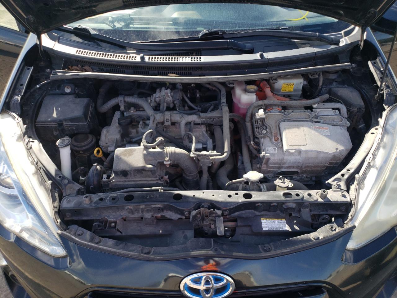 Photo 7 from auction – 2015 TOYOTA PRIUS C with VIN JTDKDTB36F1585420