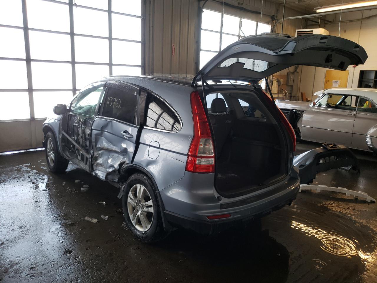 Photo 3 from auction – 2011 HONDA CR-V EXL with VIN JHLRE3H74BC006206