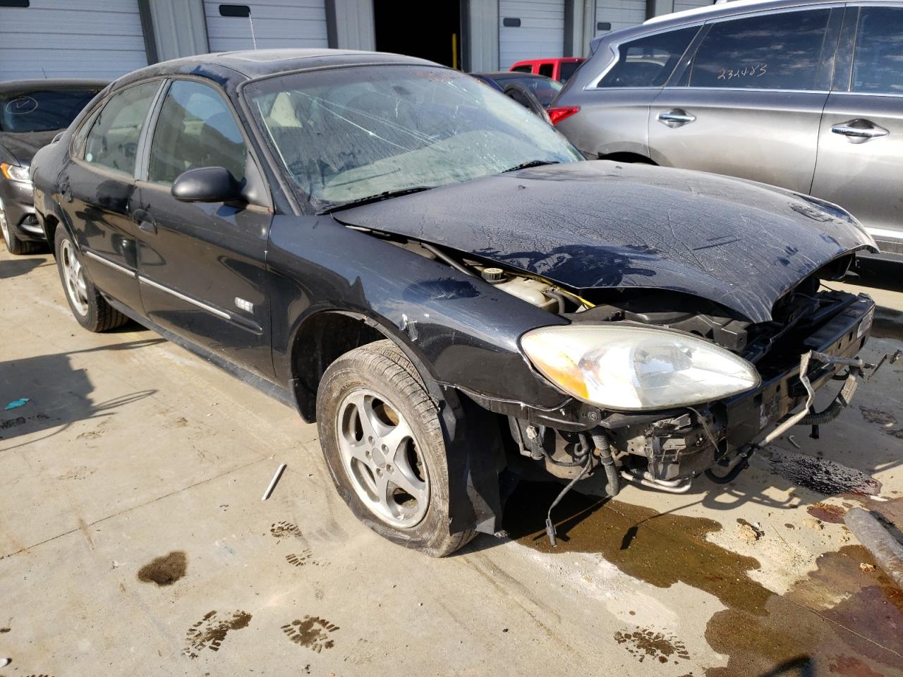 FORD TAURUS SEL 2003 with VIN 1FAHP56S83A232483 - Photo from auction