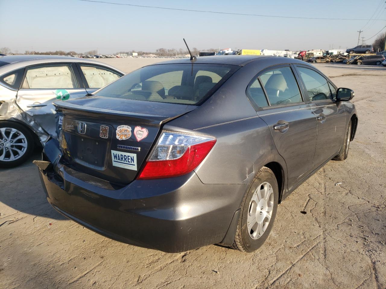 Photo 4 from auction – 2012 HONDA CIVIC HYBR with VIN JHMFB4F33CS011031